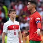 Almanya'nın ev sahipliğinde düzenlenen 2024 Avrupa Futbol Şampiyonası (EURO 2024) F Grubu’nda Türkiye ile Portekiz takımları Dortmund’da bulunan BVB Stadyumu'nda karşı karşıya geldi. Türkiye'den Arda Güler (8) ve Portekiz'den Cristiano Ronaldo (sağda), maçta forma giydi. ( Emin Sansar - Anadolu Ajansı )